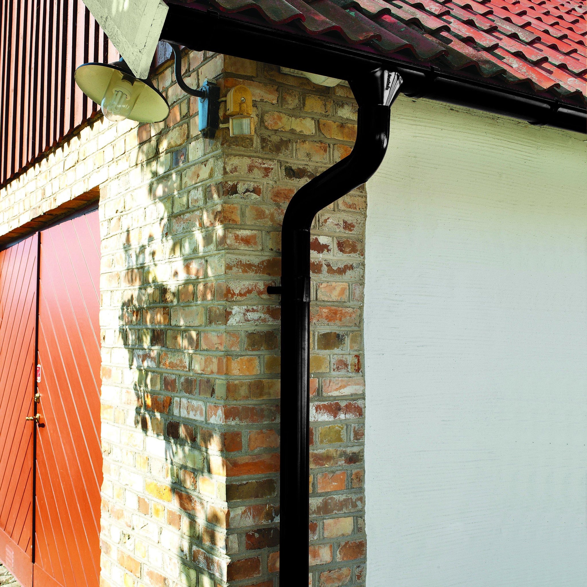 Roof with Lindab Half Round Gutters and Downpipes - SCP Online Store